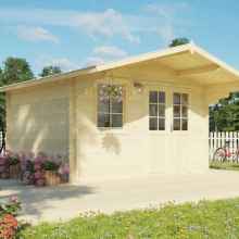 A garden shed with an extended gable roof style. This wooden shed has double wide half-glazed doors and a window at the front. The entire structure is built on a wooden deck, with a hanging chair for relaxation. It is surrounded by trees, shrubs, and flowers.