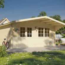 A log garden shed with half-glazed double-wide doors and a window. The roof is in an open gable style, and the surroundings are adorned with plants and flowers.