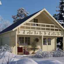 A 3D rendered image of a wooden cabin with a gable roof and a covered porch. The cabin is made of light-colored wood with a dark roof. Above the porch, there is a balcony with a railing featuring cut-out patterns. The cabin has a cozy, rustic appearance and is surrounded by snow, with a wintery background.